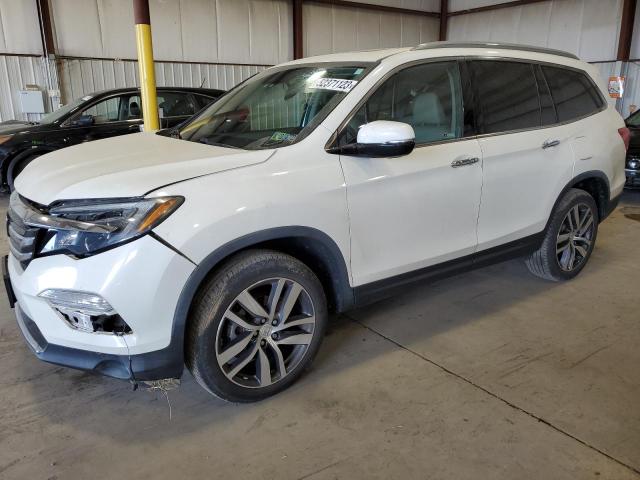 HONDA PILOT TOUR 2017 with VIN 5FNYF6H95HB092629 - Photo from auction
