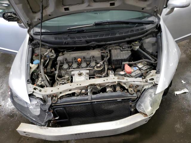 Photo 11 from auction – 2006 HONDA CIVIC LX with VIN 1HGFA16596L058052