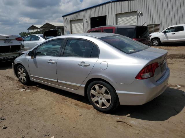 Photo 2 from auction – 2011 HONDA CIVIC LX with VIN 19XFA1F57BE028890