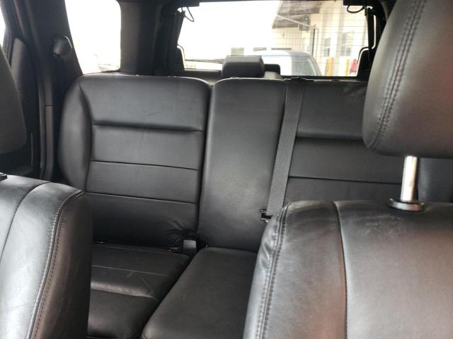 Photo 10 from auction – 2009 FORD ESCAPE LIM with VIN 1FMCU94G79KC80929