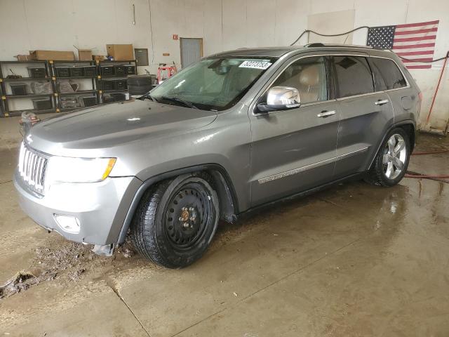 JEEP GRAND CHER 2011 with VIN 1J4RR6GT0BC690344 - Photo from auction