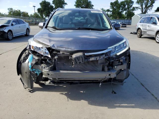 Photo 5 from auction – 2015 HONDA CR-V EXL with VIN 2HKRM3H72FH531114