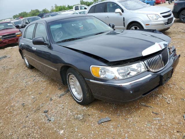 Photo 4 from auction – 2000 LINCOLN TOWN CAR E with VIN 1LNHM81W8YY918791