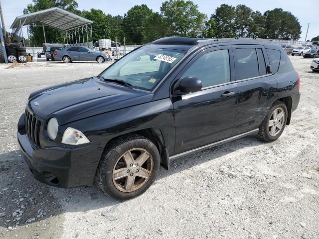JEEP COMPASS 2007 with VIN 1J8FF47W97D261083 - Photo from auction