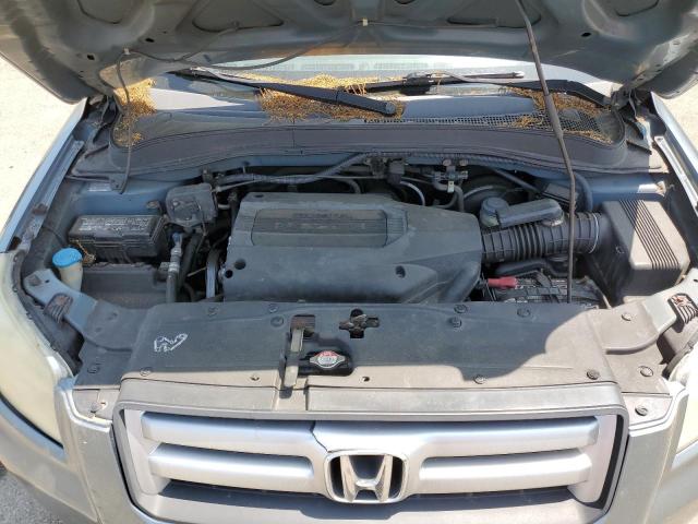 Photo 12 from auction – 2006 HONDA PILOT EX with VIN 2HKYF18466H514560