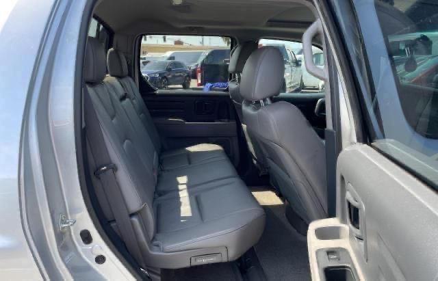 Photo 6 from auction – 2011 HONDA RIDGELINE with VIN 5FPYK1F52BB005590