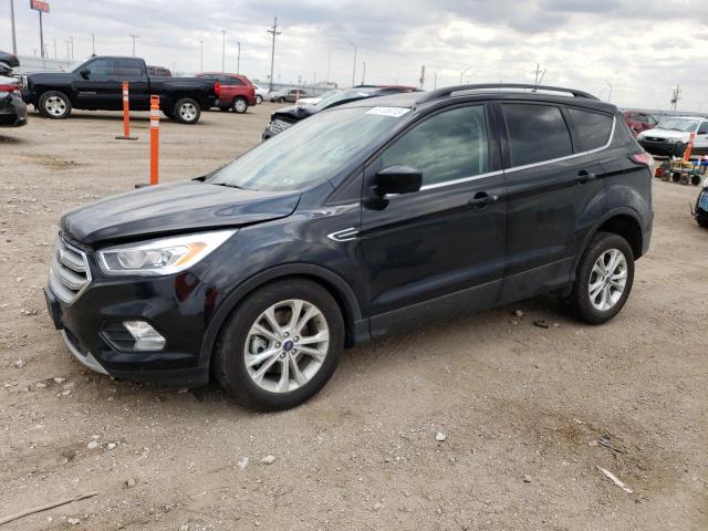FORD ESCAPE SEL 2018 with VIN 1FMCU9HDXJUC70355 - Photo from auction