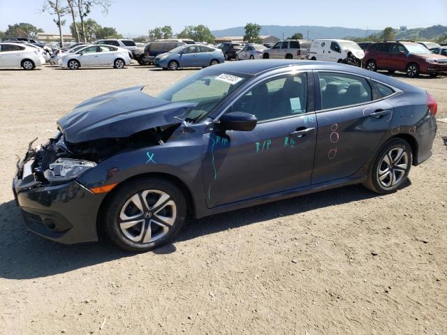 HONDA CIVIC LX 2018 with VIN 19XFC2F56JE201667 - Photo from auction