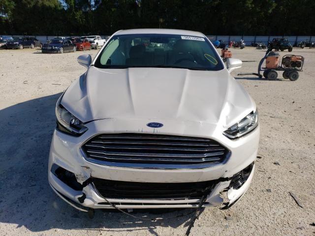Photo 5 from auction – 2014 FORD FUSION TIT with VIN 3FA6P0K90ER388667