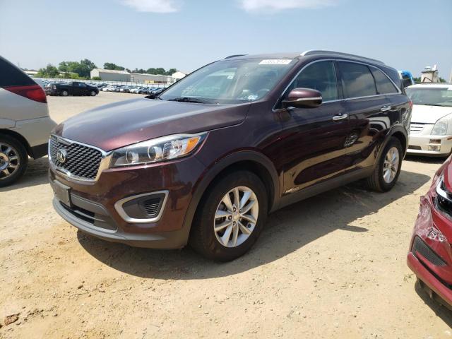 KIA SORENTO LX 2016 with VIN 5XYPGDA51GG063592 - Photo from auction