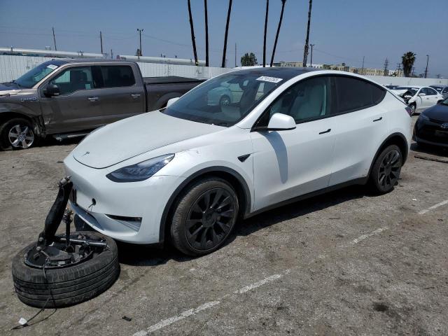 TESLA MODEL Y 2022 with VIN 7SAYGDEE1NF347066 - Photo from auction