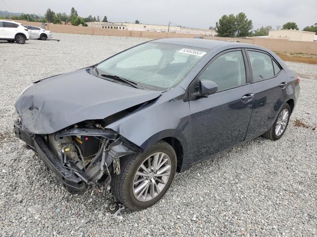 TOYOTA COROLLA L 2015 with VIN 5YFBURHE5FP312704 - Photo from auction