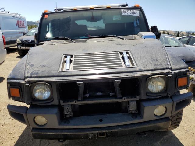 Фото 5 с аукциона – 2003 HUMMER H2 с VIN 5GRGN23U23H132398