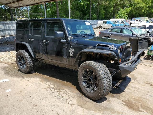 Photo 4 from auction – 2011 JEEP WRANGLER U with VIN 1J4BA7H11BL590863