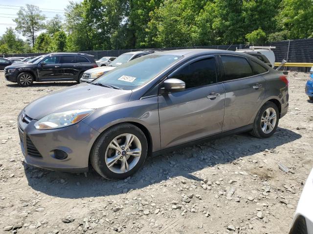 FORD FOCUS SE 2014 with VIN 1FADP3F20EL320325 - Photo from auction