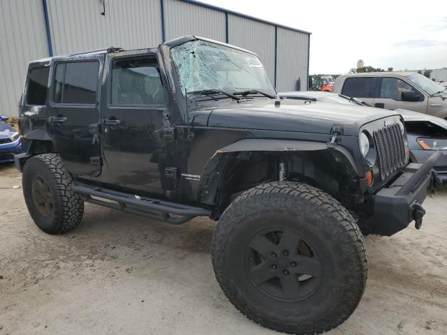Photo 4 from auction – 2011 JEEP WRANGLER U with VIN 1J4BA6H10BL550235
