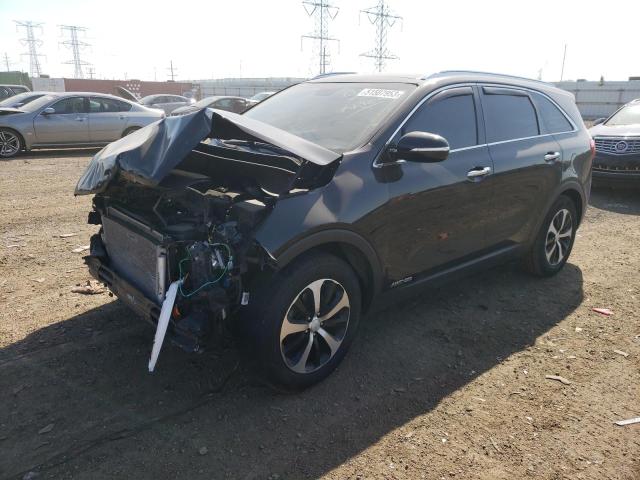 KIA SORENTO EX 2016 with VIN 5XYPHDA5XGG077990 - Photo from auction