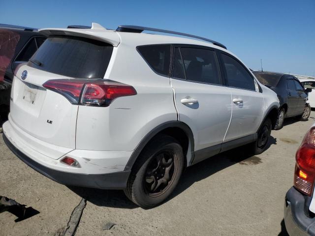 Photo 3 from auction – 2017 TOYOTA RAV4 LE with VIN JTMZFREV9HJ108668