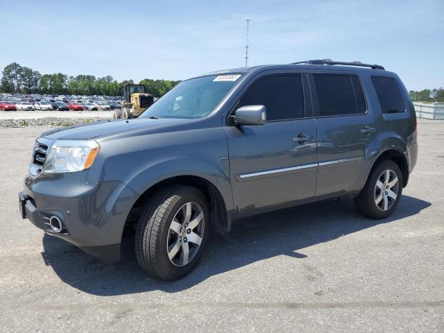 HONDA PILOT TOUR 2013 with VIN 5FNYF4H93DB008905 - Photo from auction
