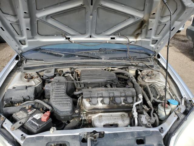 Photo 11 from auction – 2002 HONDA CIVIC LX with VIN 2HGES168X2H911794