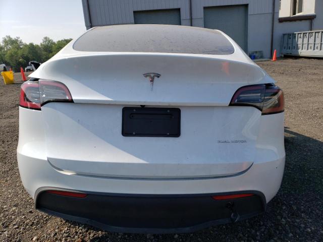 Photo 6 from auction – 2023 TESLA MODEL Y with VIN 7SAYGAEE4PF598195