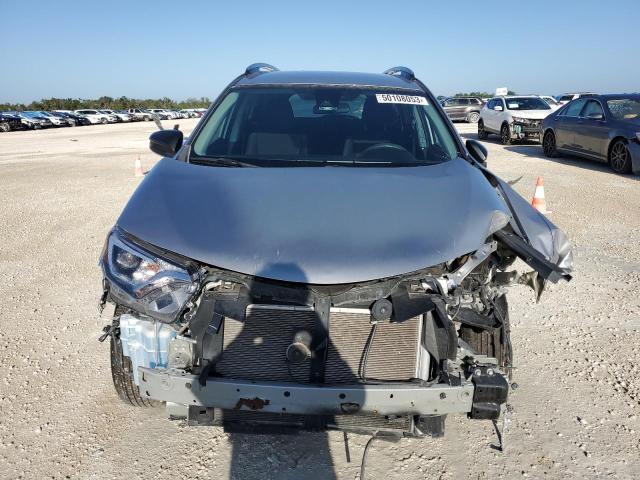 Photo 5 from auction – 2018 TOYOTA RAV4 LE with VIN 2T3ZFREV4JW465814