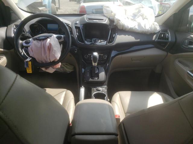 Photo 8 from auction – 2015 FORD ESCAPE TIT with VIN 1FMCU9J91FUC29142