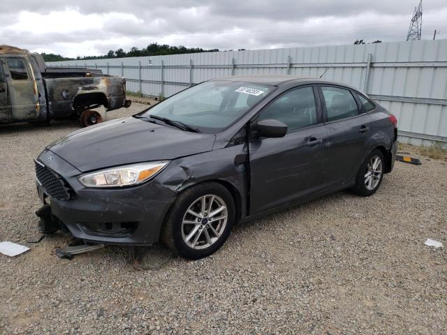 FORD FOCUS SE 2018 with VIN 1FADP3FE8JL323090 - Photo from auction