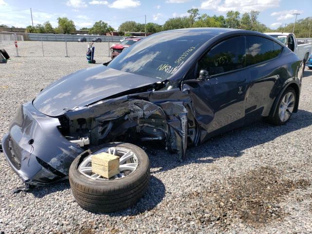 TESLA MODEL Y 2022 with VIN 7SAYGDEE8NA008463 - Photo from auction