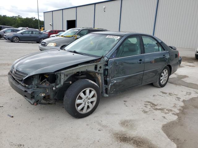 TOYOTA CAMRY LE 2002 with VIN 4T1BF32K72U537544 - Photo from auction