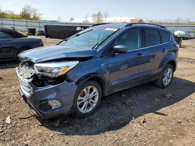 FORD ESCAPE SE 2018 with VIN 1FMCU0GD9JUB41052 - Photo from auction