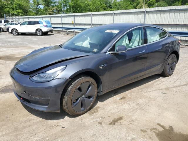 TESLA MODEL 3 2018 with VIN 5YJ3E1EB3JF066401 - Photo from auction