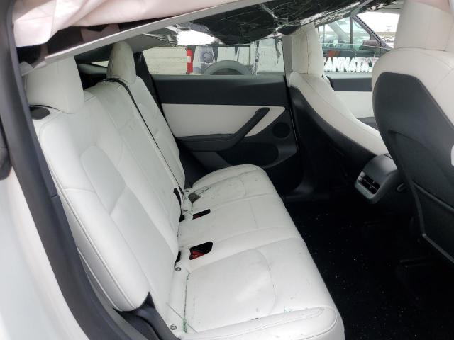 Photo 11 from auction – 2021 TESLA MODEL Y with VIN 5YJYGDED4MF181385