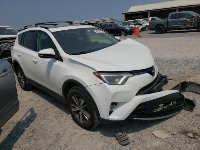 Photo 4 from auction – 2016 TOYOTA RAV4 XLE with VIN JTMWFREV0GD083448