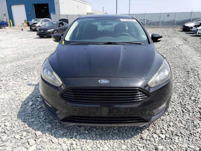 Photo 5 from auction – 2016 FORD FOCUS SE with VIN 1FADP3KE8GL316641