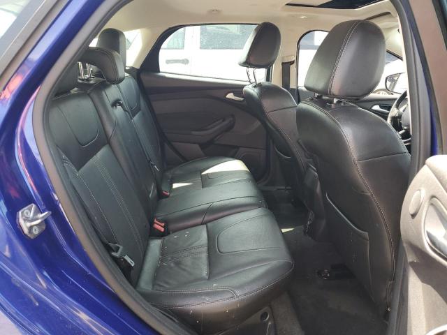 Photo 10 from auction – 2014 FORD FOCUS TITA with VIN 1FADP3N25EL320077