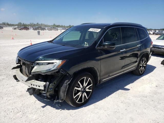 HONDA PILOT TOUR 2019 with VIN 5FNYF5H98KB009079 - Photo from auction