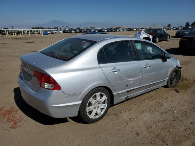 Photo 3 from auction – 2011 HONDA CIVIC LX with VIN 19XFA1F59BE039499