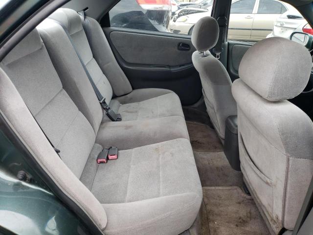 Photo 10 from auction – 1998 MAZDA 626 DX with VIN 1YVGF22C7W5713399