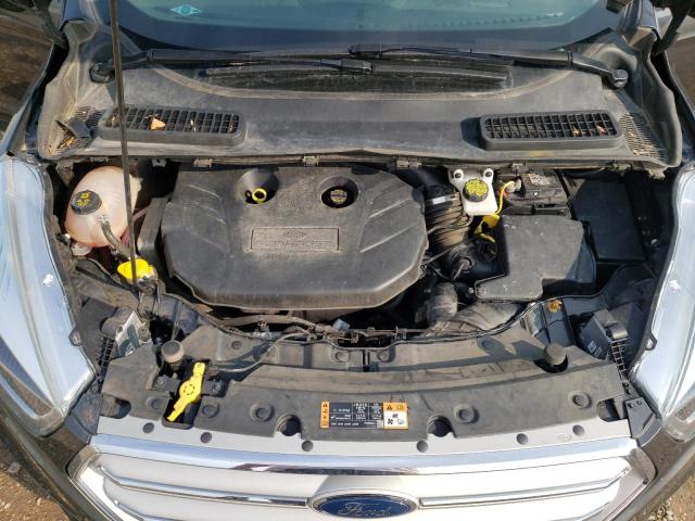 Photo 11 from auction – 2018 FORD ESCAPE TIT with VIN 1FMCU0J90JUA31642