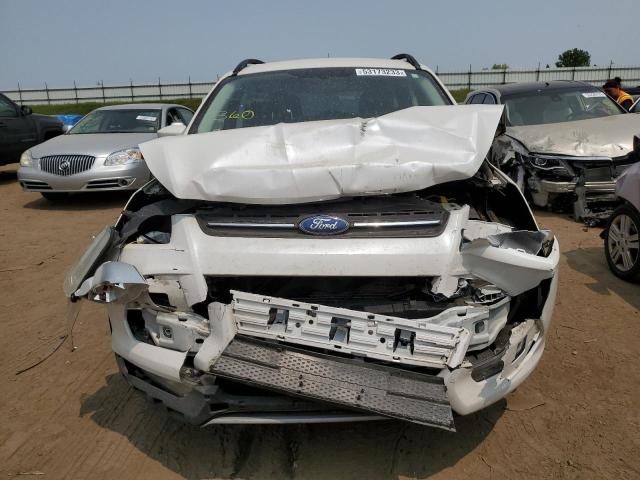 Photo 5 from auction – 2014 FORD ESCAPE SE with VIN 1FMCU9G90EUD04354