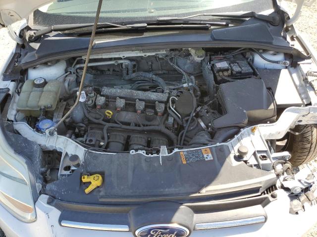 Фото 11 с аукциона – 2014 FORD FOCUS SE с VIN 1FADP3K25EL413900