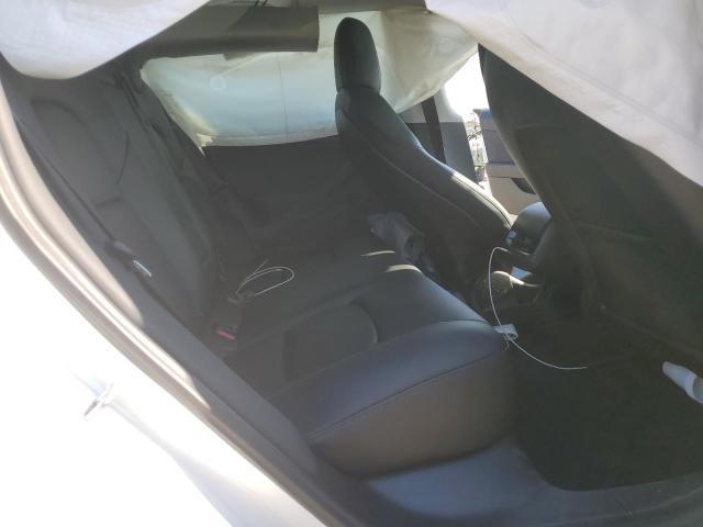 Photo 10 from auction – 2021 TESLA MODEL 3 with VIN 5YJ3E1EA7MF977861