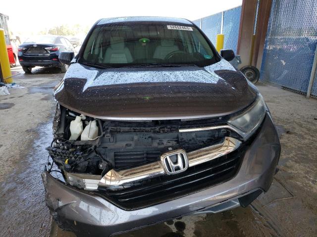 Photo 5 from auction – 2017 HONDA CR-V LX with VIN 7FARW5H32HE014470