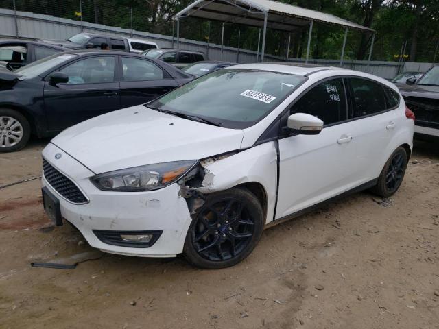 FORD FOCUS SE 2016 with VIN 1FADP3K21GL374788 - Photo from auction