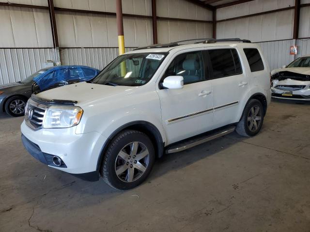 HONDA PILOT TOUR 2014 with VIN 5FNYF4H97EB043206 - Photo from auction