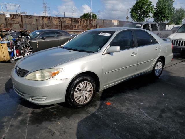 TOYOTA CAMRY LE 2002 with VIN JTDBE32K320136748 - Photo from auction