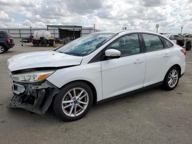 FORD FOCUS SE 2016 with VIN 1FADP3F22GL345312 - Photo from auction