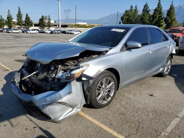 TOYOTA CAMRY LE 2015 with VIN 4T1BF1FKXFU037155 - Photo from auction