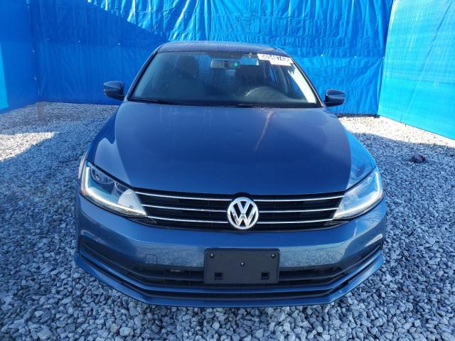 Photo 5 from auction – 2018 VOLKSWAGEN JETTA S with VIN 3VW2B7AJ5JM209555